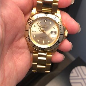 Invicta gold men’s watch